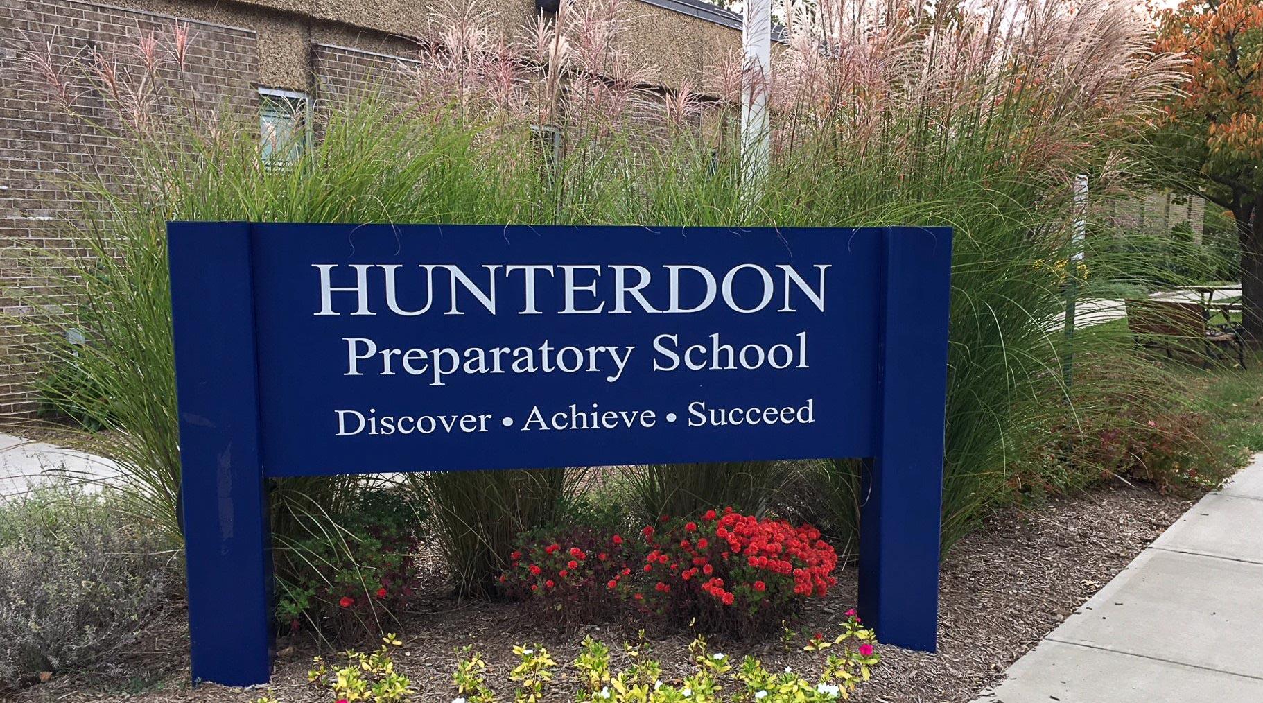 A picture of Hunterdon Preparatory School showing the entrance and school sign