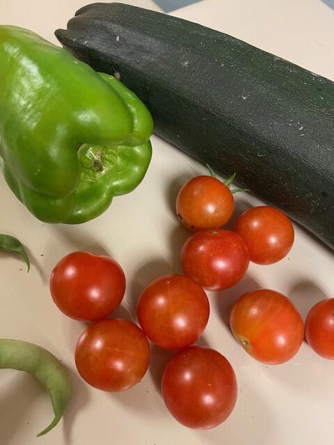 picture of zucchini, green pepper and small tomatoes