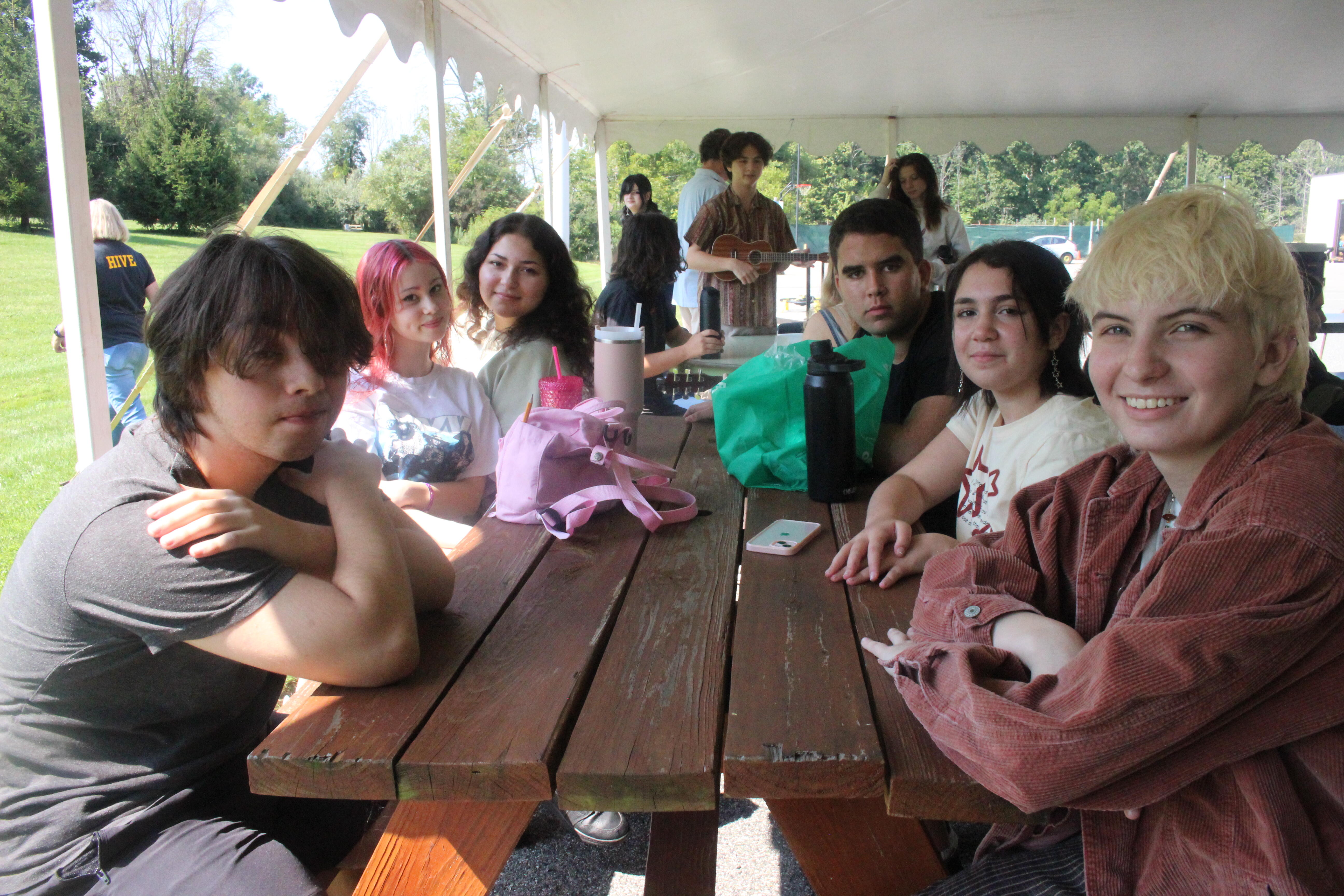 group of students at a picnic table