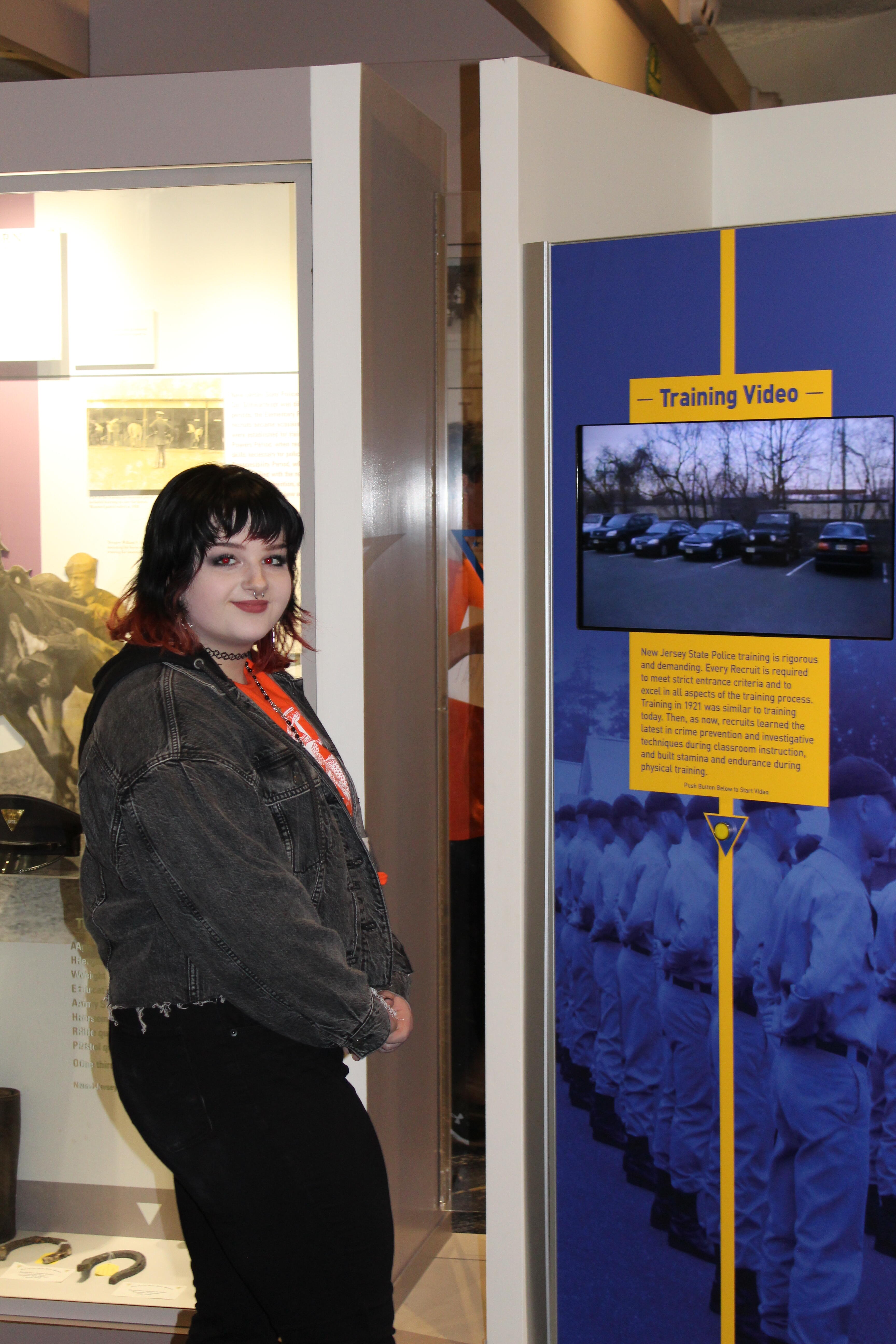 Student at museum display
