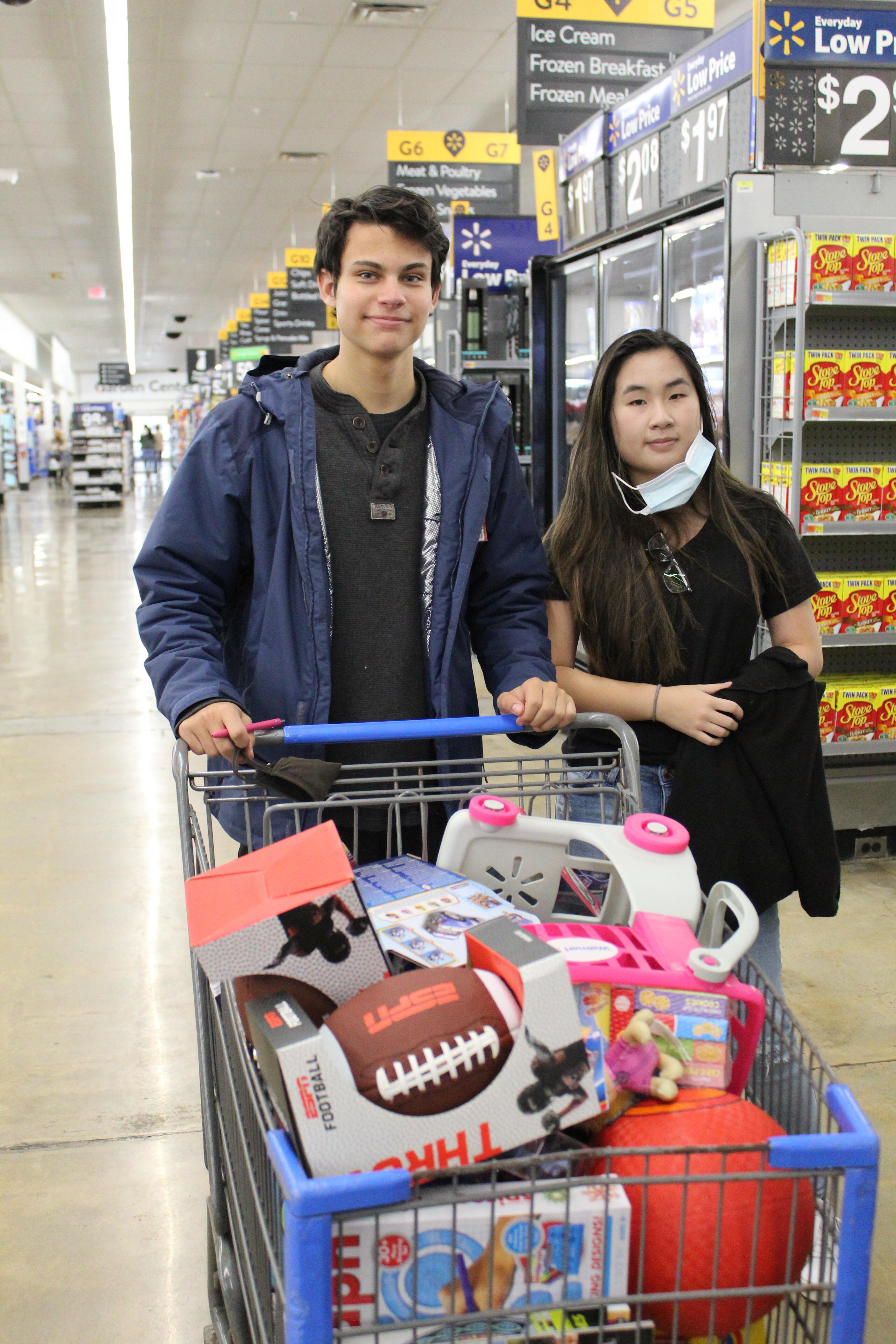 two students with shopping cart