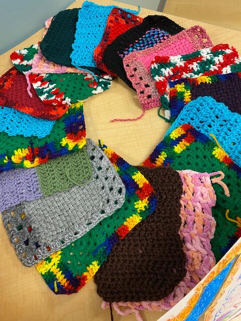 knitted squares spread out in a circle